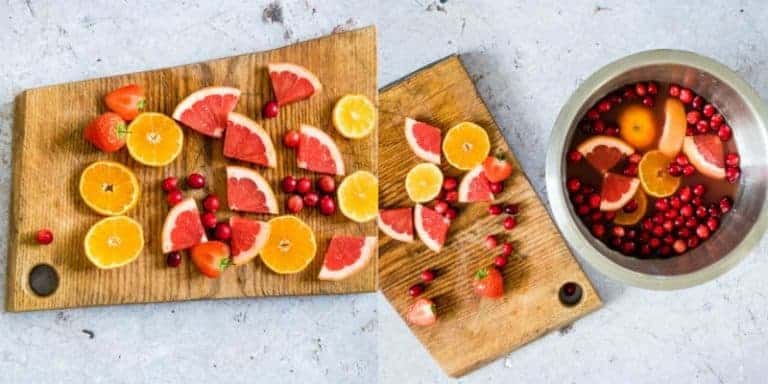 making easy fruit punch collage. Sliced fruit on a chopping board and in a bowl of punch