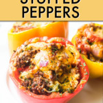 Three stuffed peppers on a plate