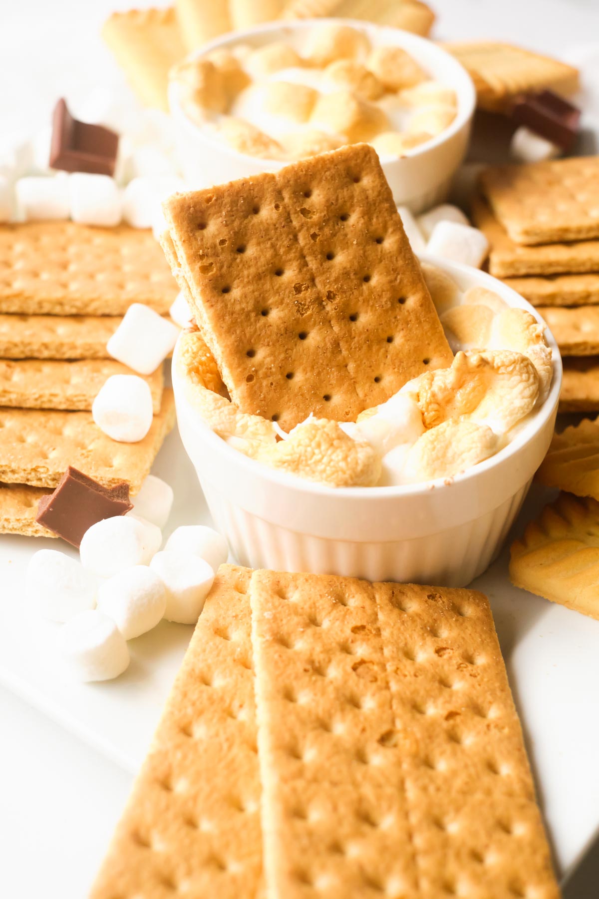 a graham cracker stuck into the completed air fryer smores dip
