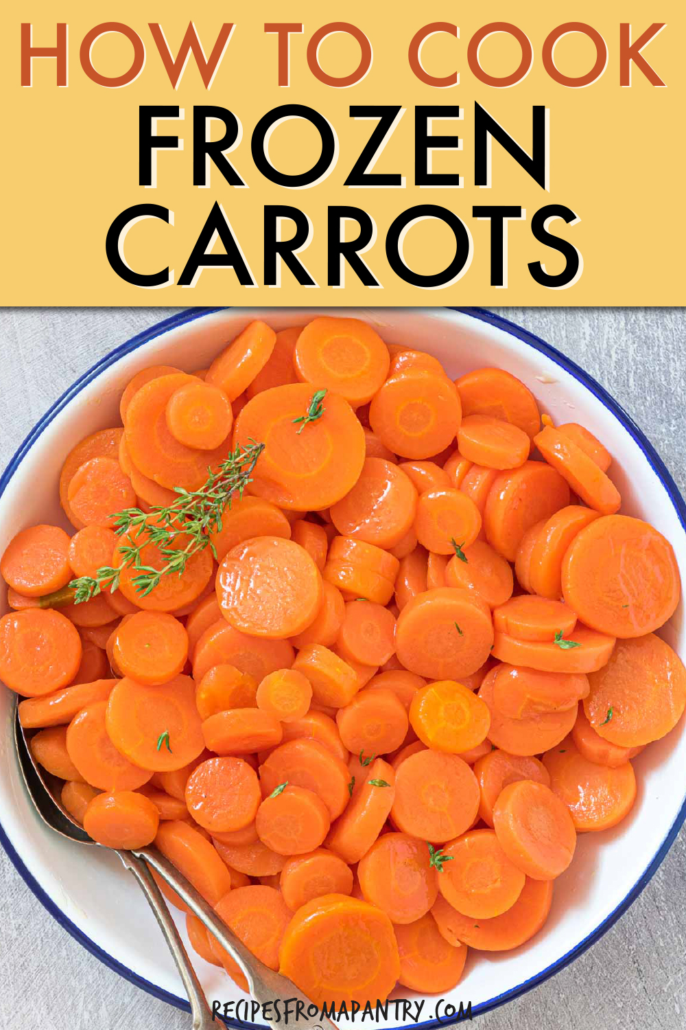 overhead view of sliced cooked carrots in a serving bowl