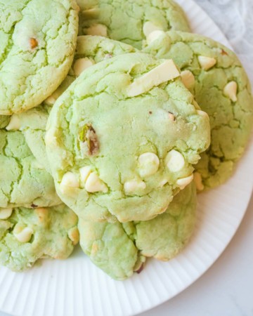 the finished air fryer pistachio pudding cookies served on a white plate