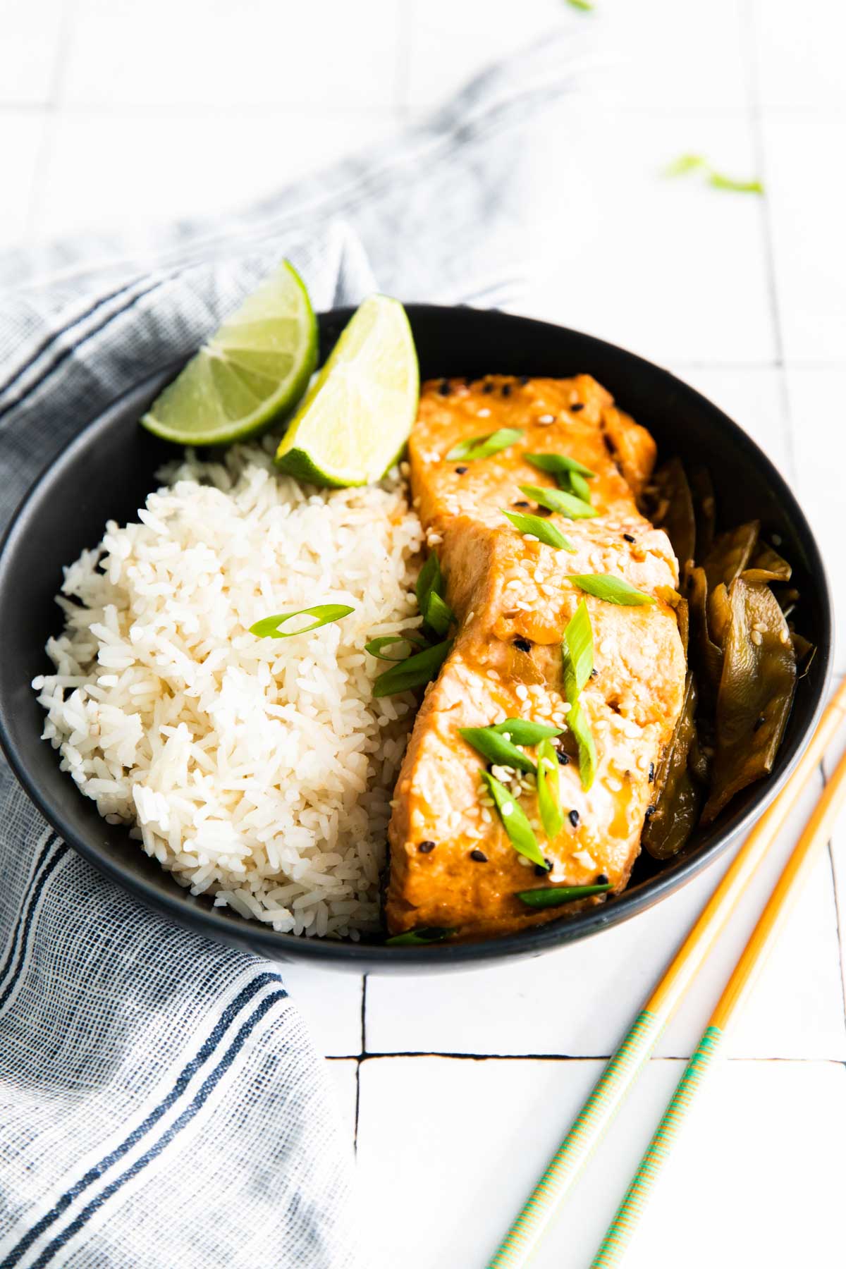 a bowl of instant pot salmon teriyaki and rice.