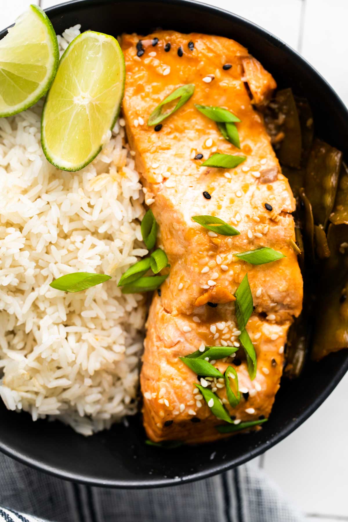 close up view of the finished instant pot salmon served with rice.