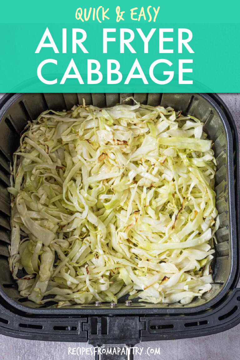 shredded cabbage in an air fryer basket