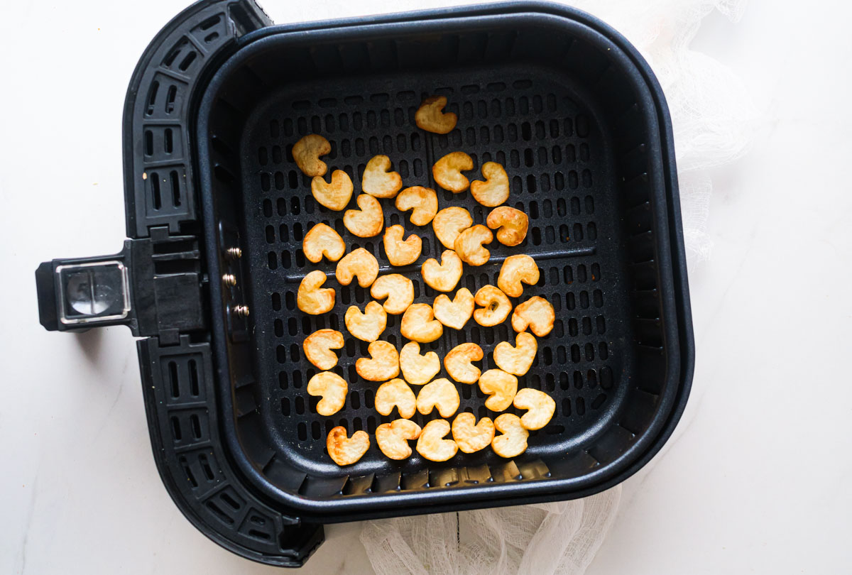 heart potatoes inside the air fryer basket