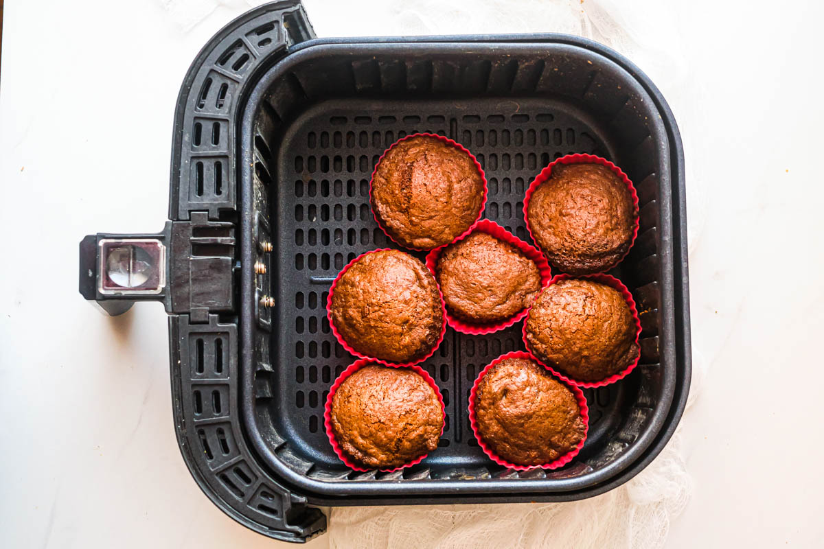 baked air fryer cupcakes in the air fryer basket