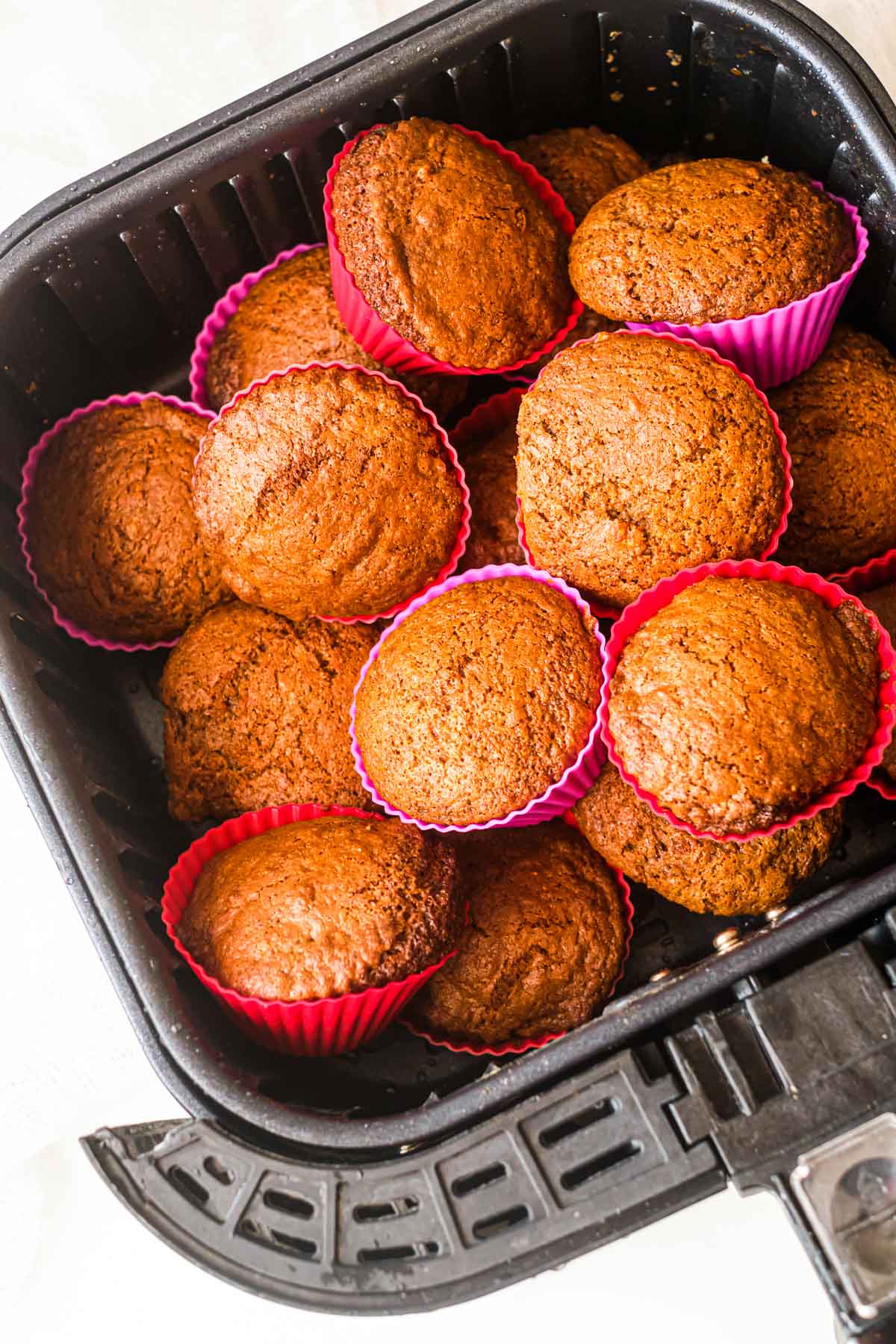 top down view of cooked air fryer cupcakes inside the air fryer basket
