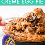A SPOON DIPPING INTO A CREME EGG PIE WITH A WRAPPED CADBURY CREME EGG IN THE FOREGROUND