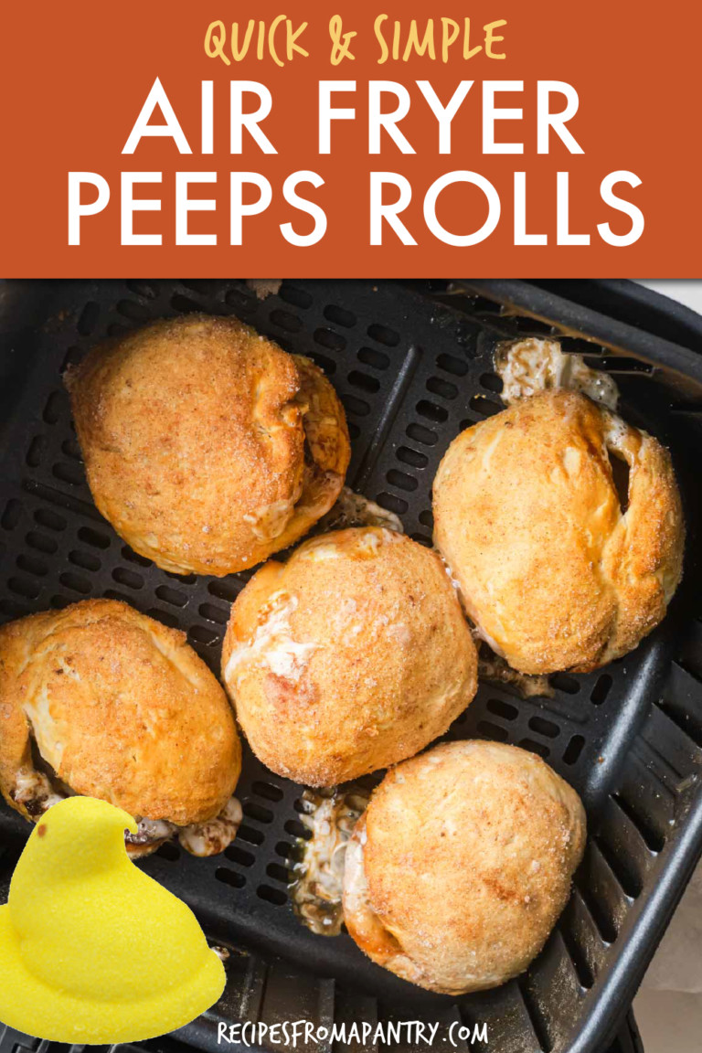DOUGH WRAPPED PEEPS IN AN AIR FRYER BASKET WITH A PEEP IN THE FOREGROUND