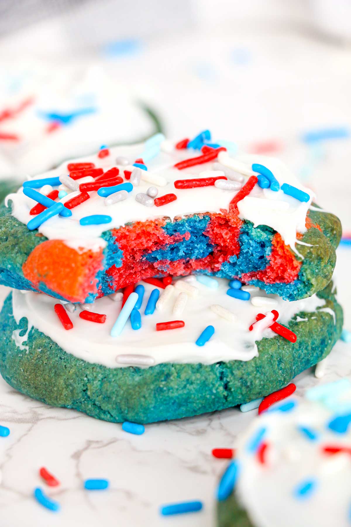 two air fryer 4th of july cookies with a bite removed from one