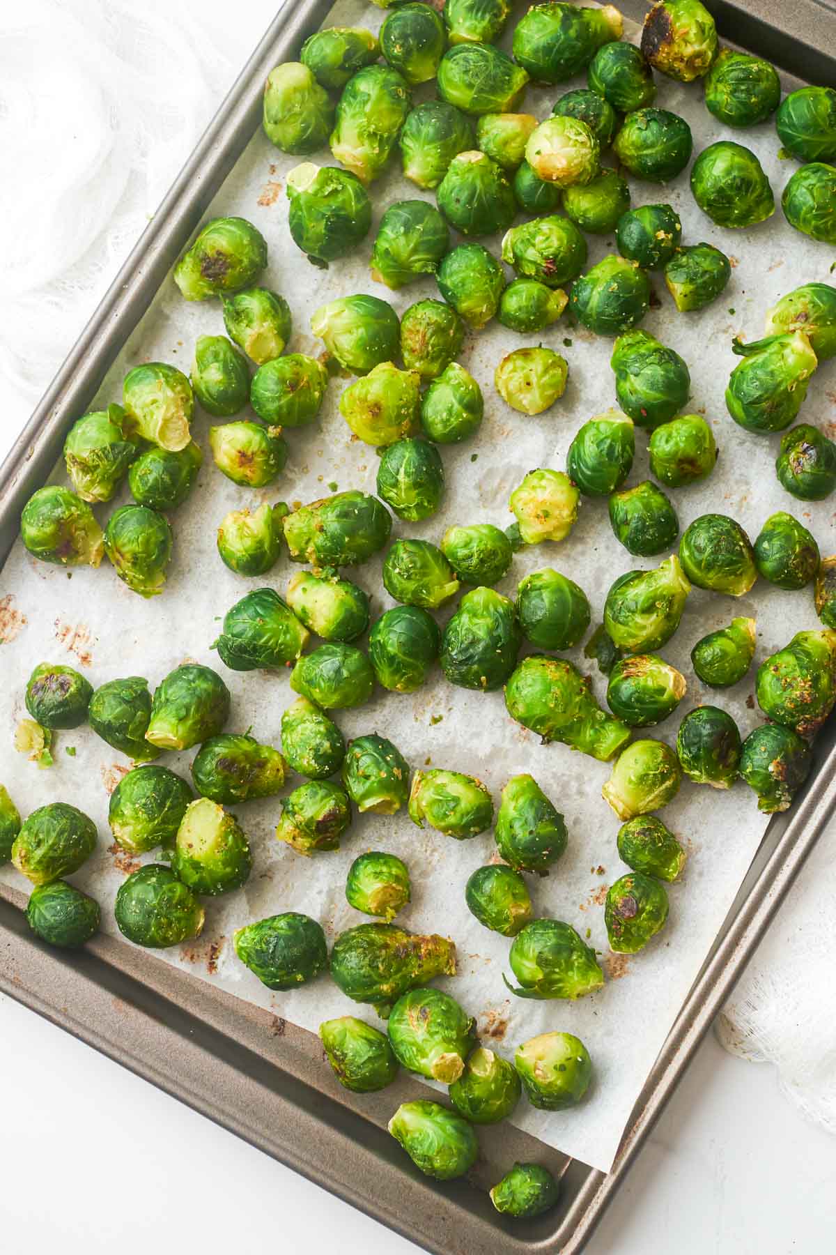 roasted frozen brussel sprouts on a sheet pan
