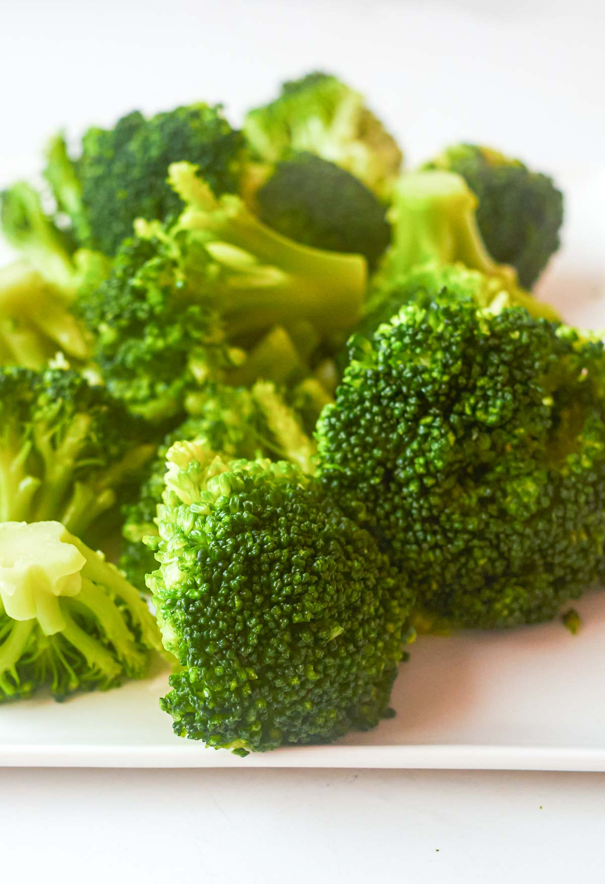 learn how to boil broccoli that turns out crisp tender as shown on this plate