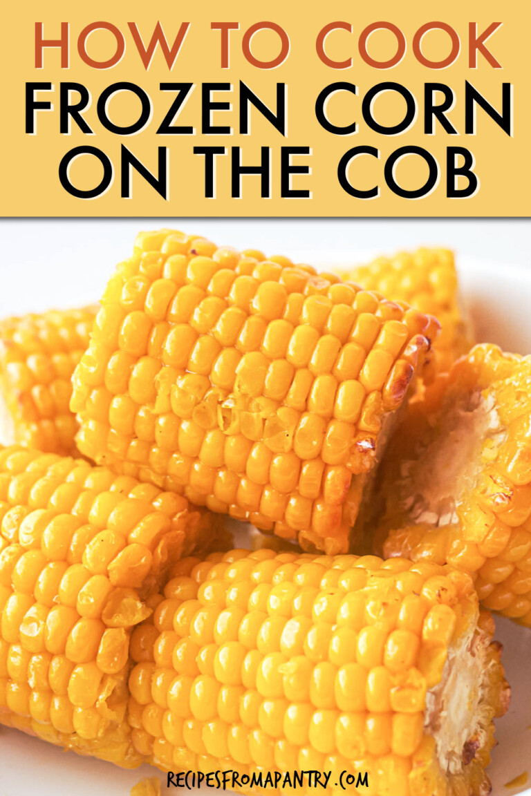 A close-up of a pile of cooked corn cobs on a plate