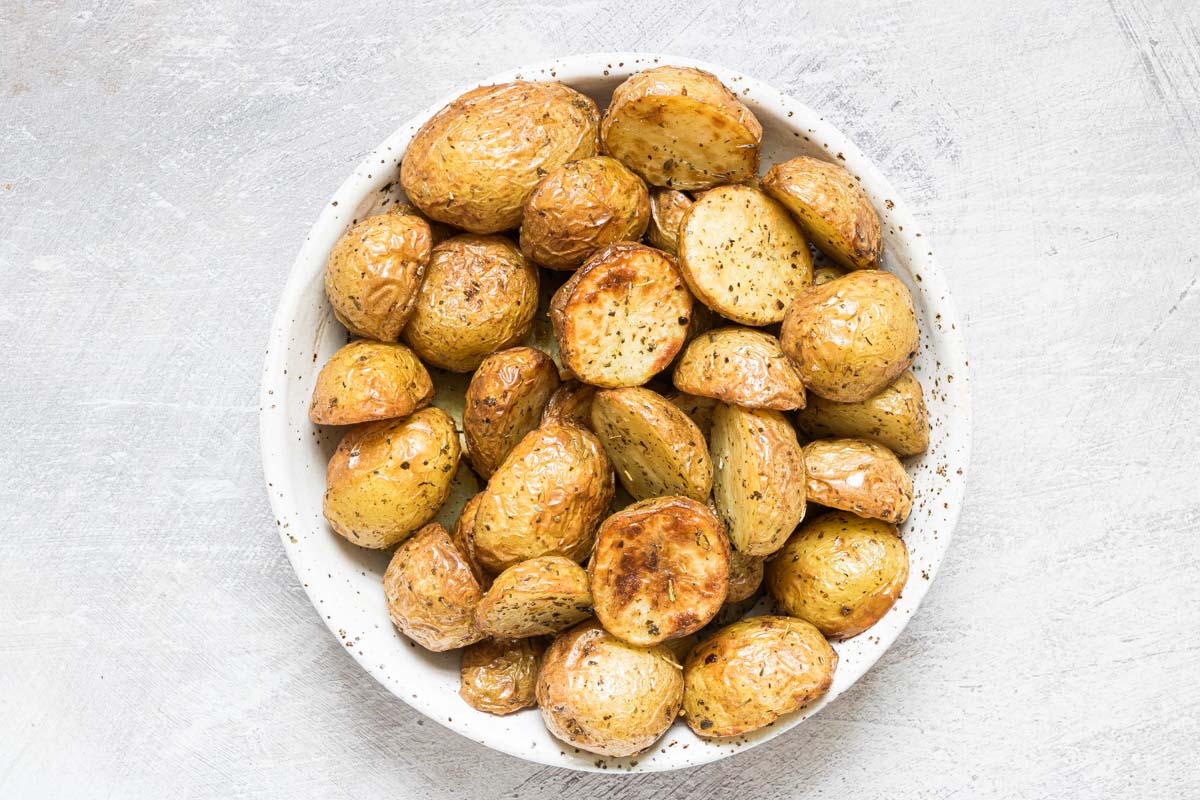 a bowl of air fryer baby potatoes ready to be served