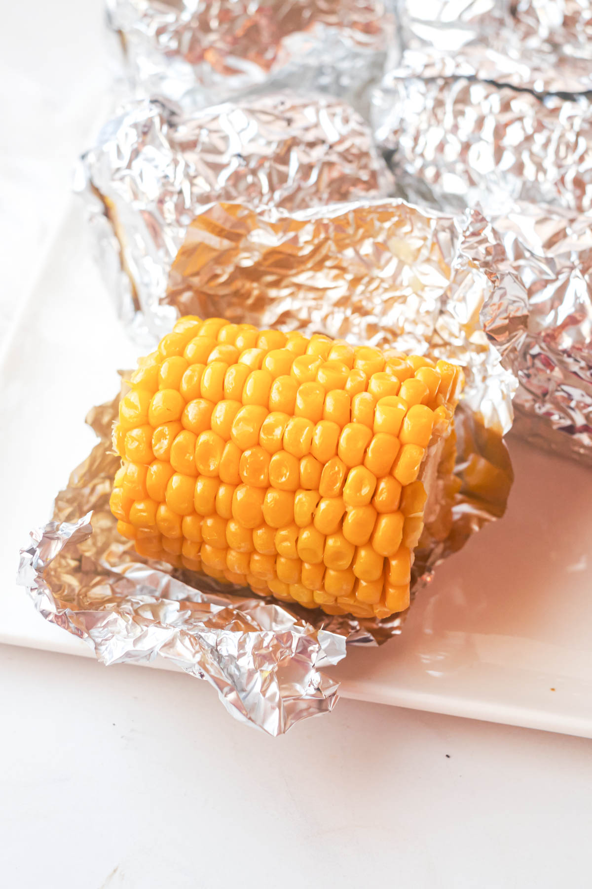 a serving of corn on the cob in the oven