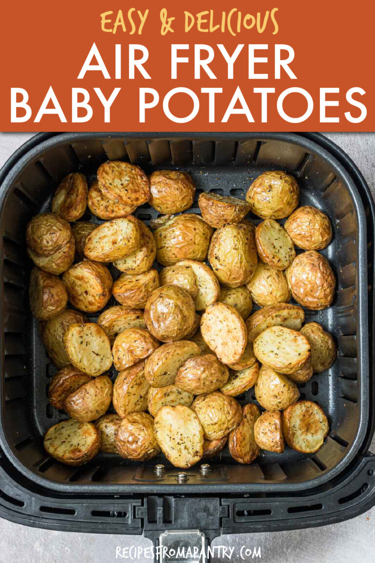 halved baby potatoes on an air fryer basket