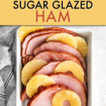 Layered ham and pineapple slices in a rectangular serving dish