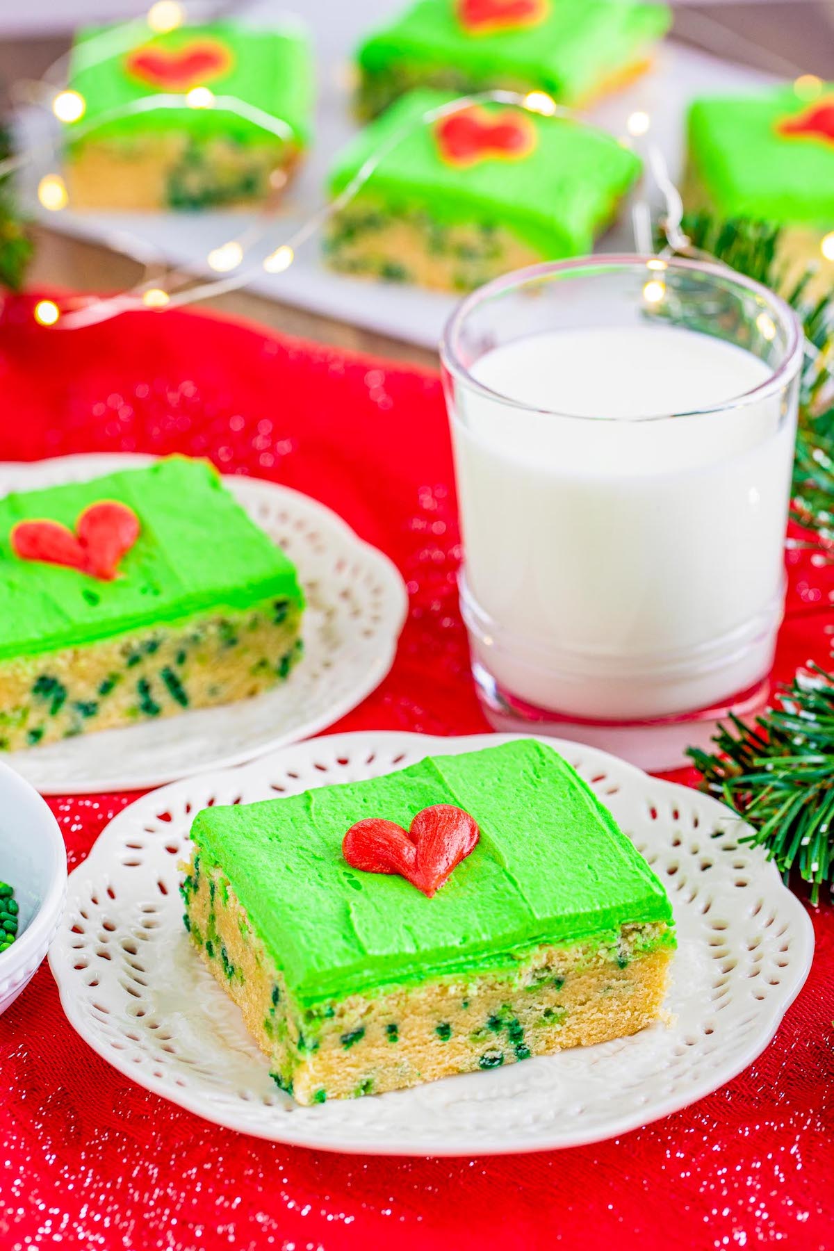 This collection of Christmas Grinch Treats inspired by the classic Christmas movie is sure to get you in the holiday spirit! These festive and colorful cookies, popcorn, punch, cupcakes, cocoa, candy bark, fudge, and even fruit kabobs more will add tons of fun to your Christmas season. Perfect for holiday parties, potlucks, and of course, movie night! Click through to get these awesome Christmas Grinch Treat recipes!! #christmas #grinch #grinchrecipes #christmasrecipes #christmascookies #holiday