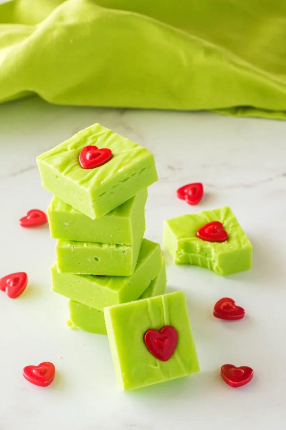 This collection of Christmas Grinch Treats inspired by the classic Christmas movie is sure to get you in the holiday spirit! These festive and colorful cookies, popcorn, punch, cupcakes, cocoa, candy bark, fudge, and even fruit kabobs more will add tons of fun to your Christmas season. Perfect for holiday parties, potlucks, and of course, movie night! Click through to get these awesome Christmas Grinch Treat recipes!! #christmas #grinch #grinchrecipes #christmasrecipes #christmascookies #holiday