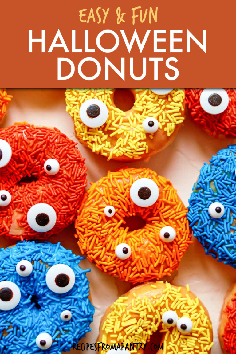 various donuts with different colored sprinkles and candy eyeballs