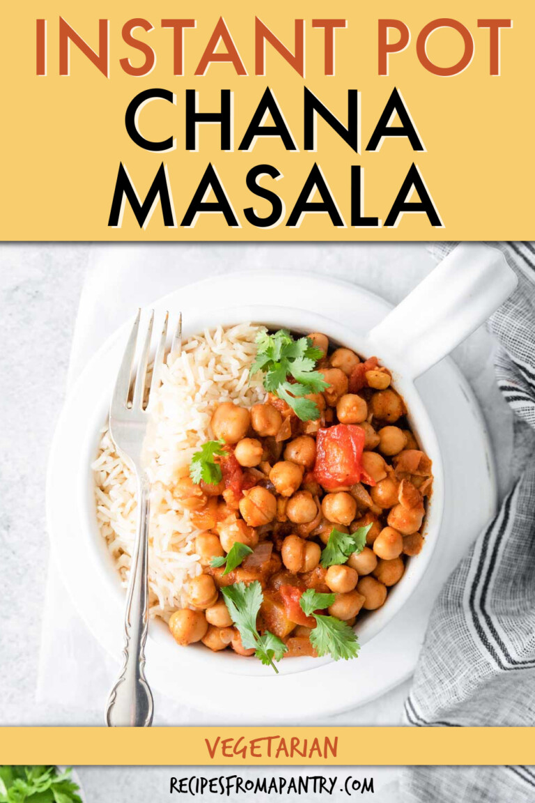 chana masala with rice in a bowl with a fork