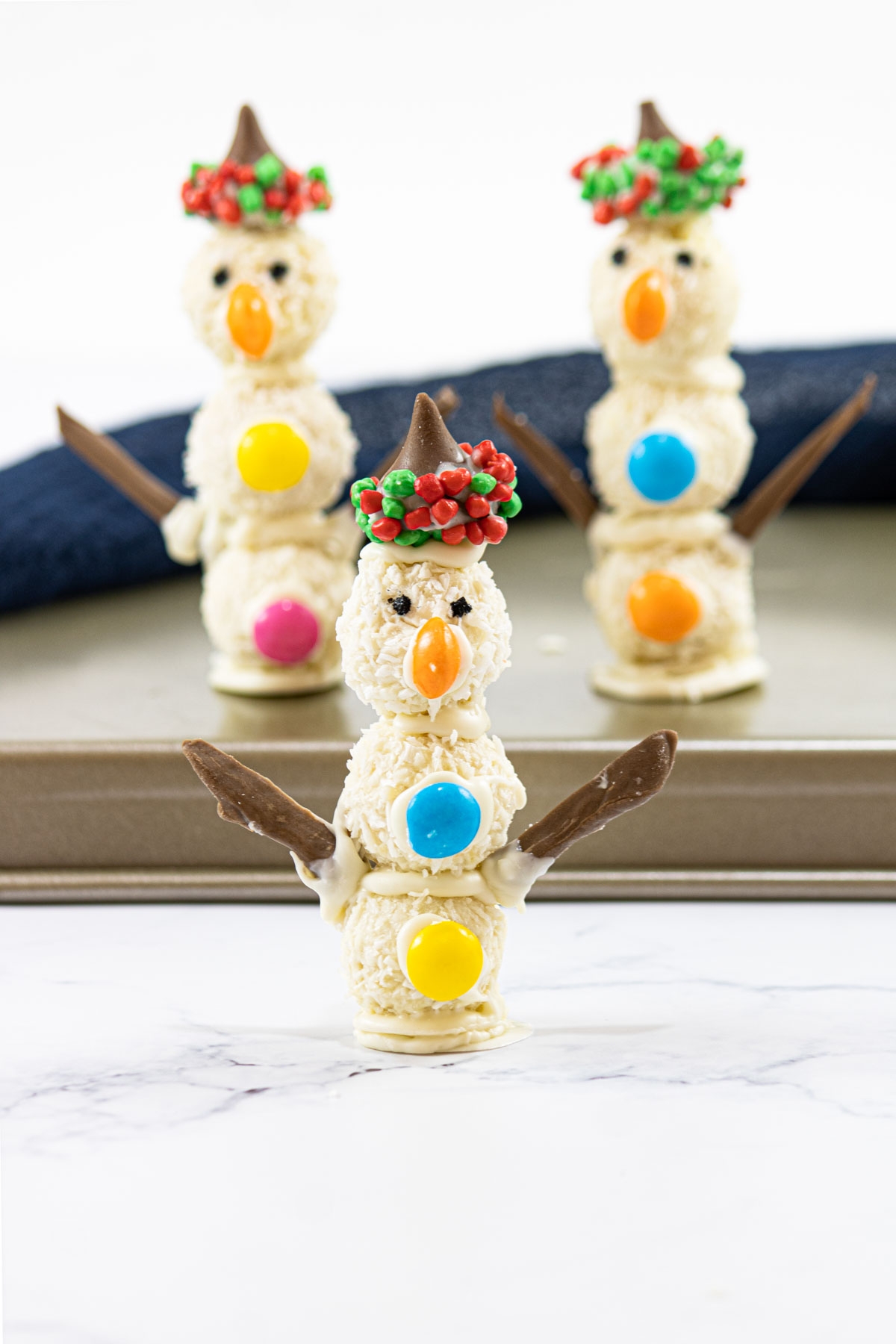 three edible snowmen ready to be served