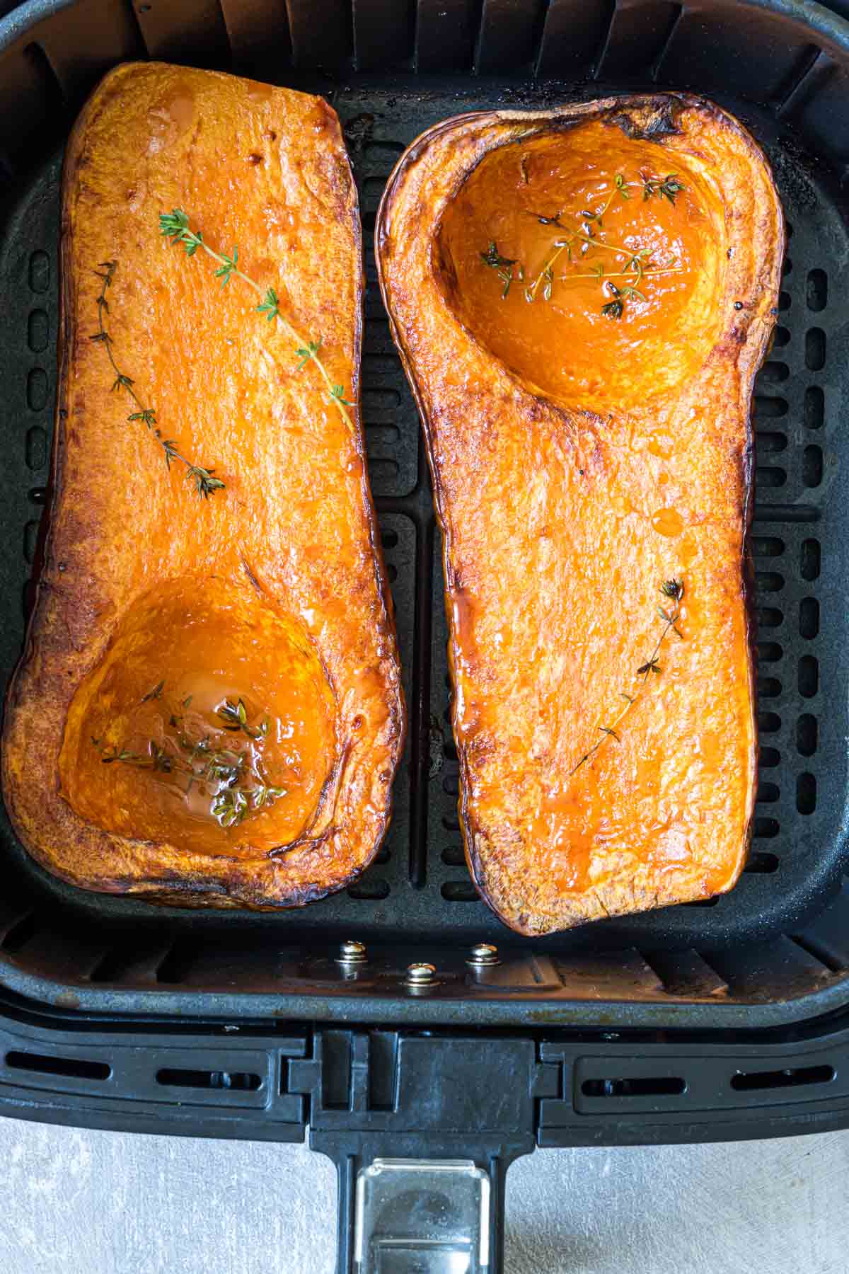 the finished squash recipe in the air fryer basket