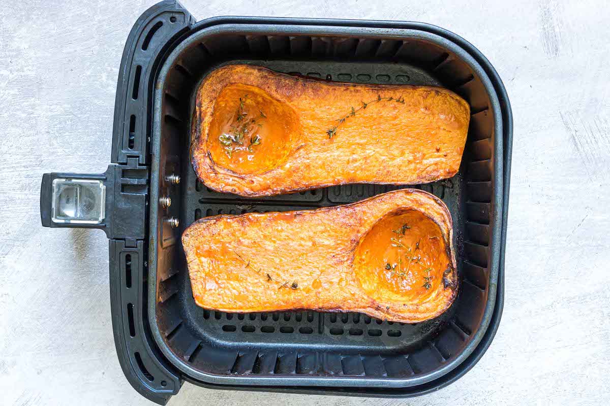 top down view of the cooked butternut squash inside the air fryer basket