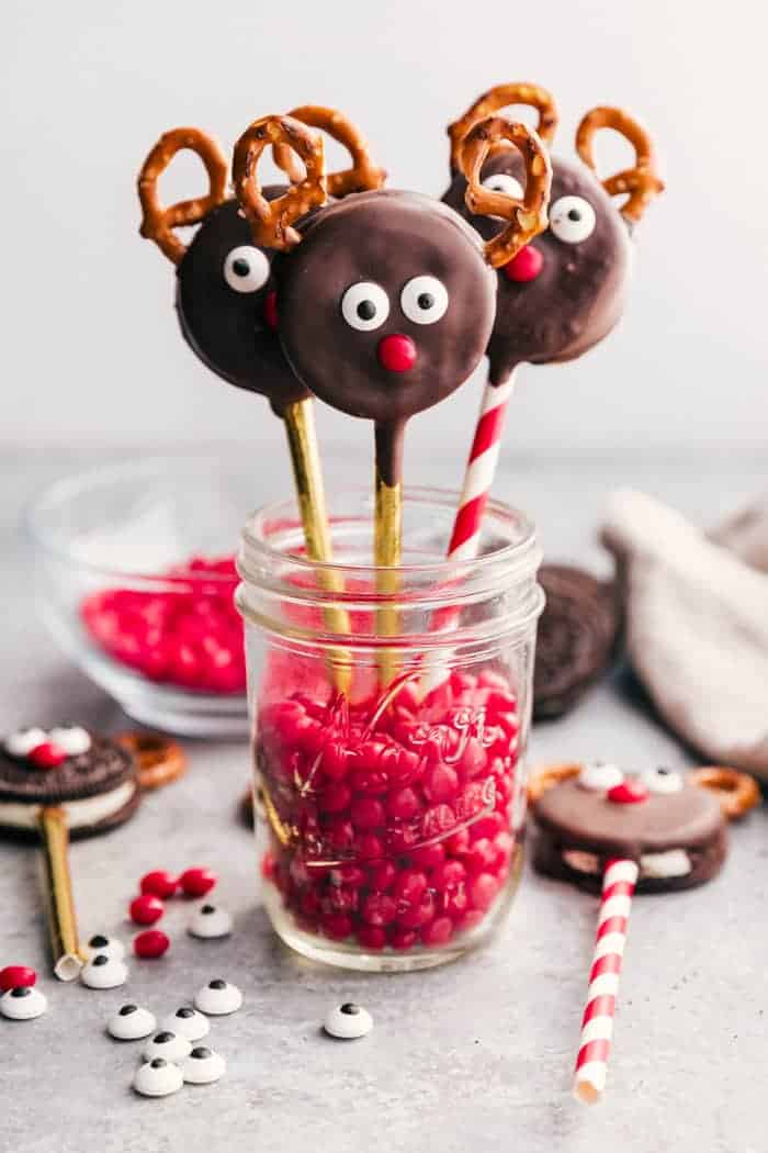 Fun and Festive Reindeer Treats are perfect for getting in the holiday spirit! Great for sharing, these adorable reindeer treats are sure to be a hit at Christmas parties, potlucks, or any gathering this season. From cute reindeer pretzel bites, donut holes, and hot chocolate bombs, to Rudolph cheesecake, cookies, and chocolate cake, these reindeer treats are fun to make totally delicious. Click through to get this collection of Reindeer Treat Recipes!! #reindeertreats #holidayrecipes #christmas
