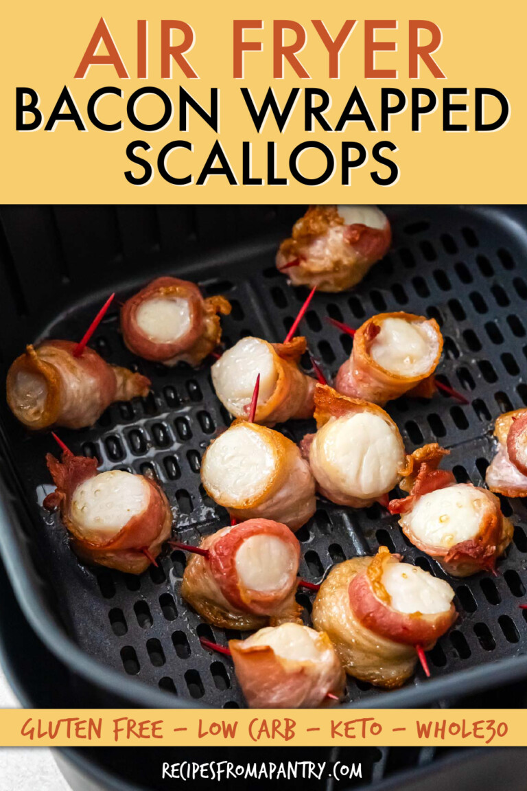 cooked bacon wrapped scallops in an air fryer basket