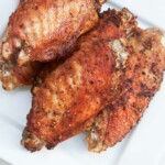 the finished air fryer turkey wings on a plate and ready to serve