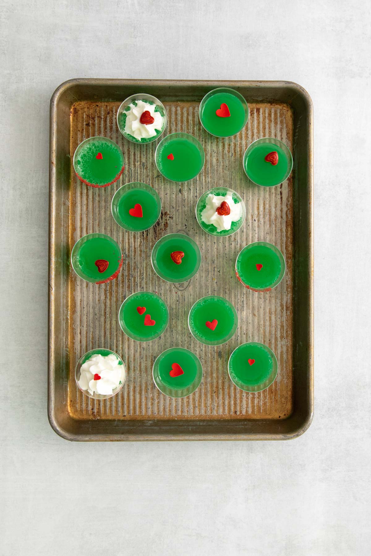 top down view of the completed Grinch Jello Shots on a baking tray