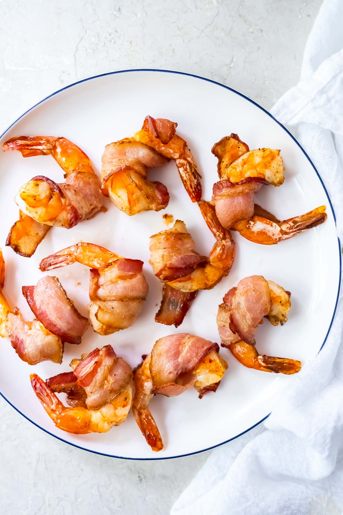 the finished bacon wrapped shrimp air fryer recipe ready to serve