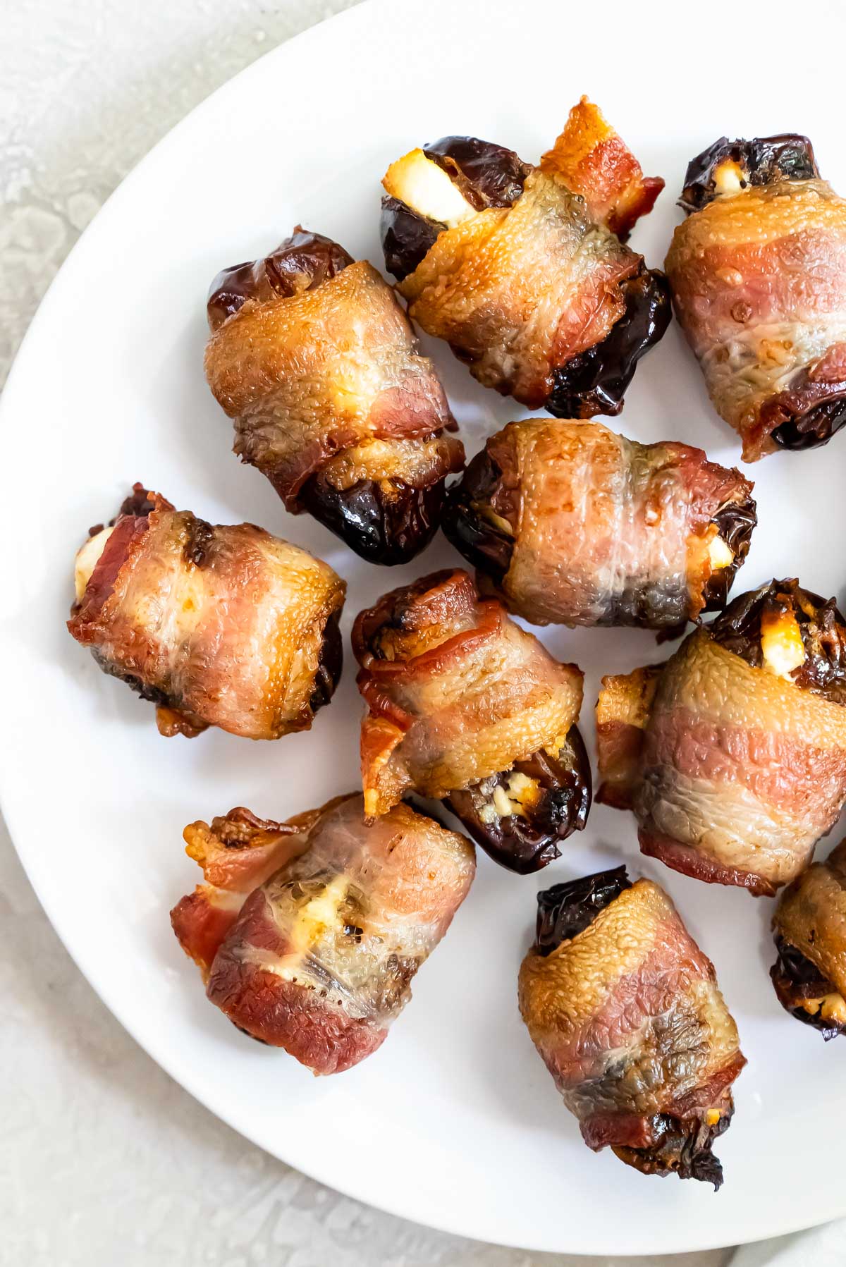 close up view of the completyed bacon wrapped dates air fryer recipe