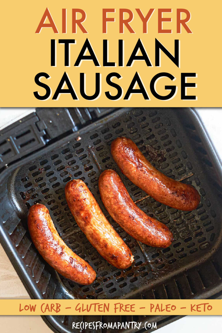 four cooked italian sausages in an air fryer basket
