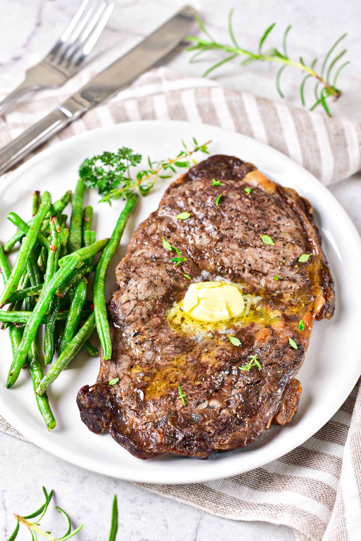 one air fryer steak served topped with butter