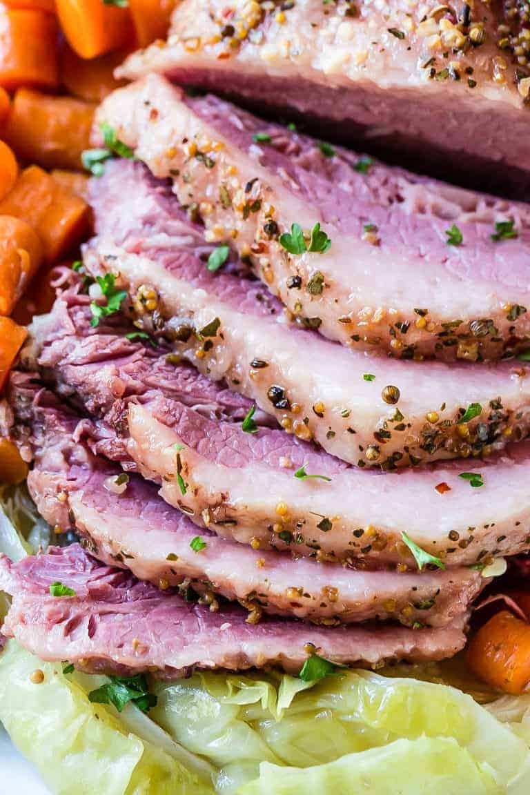 close up view of slices of Instant Pot Corned Beef and Cabbage