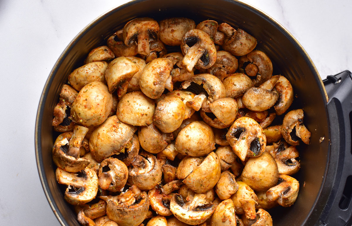 the cooked mushrooms in air fryer basket