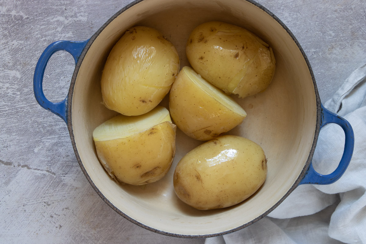 cubed potatoes inside a cooking pot