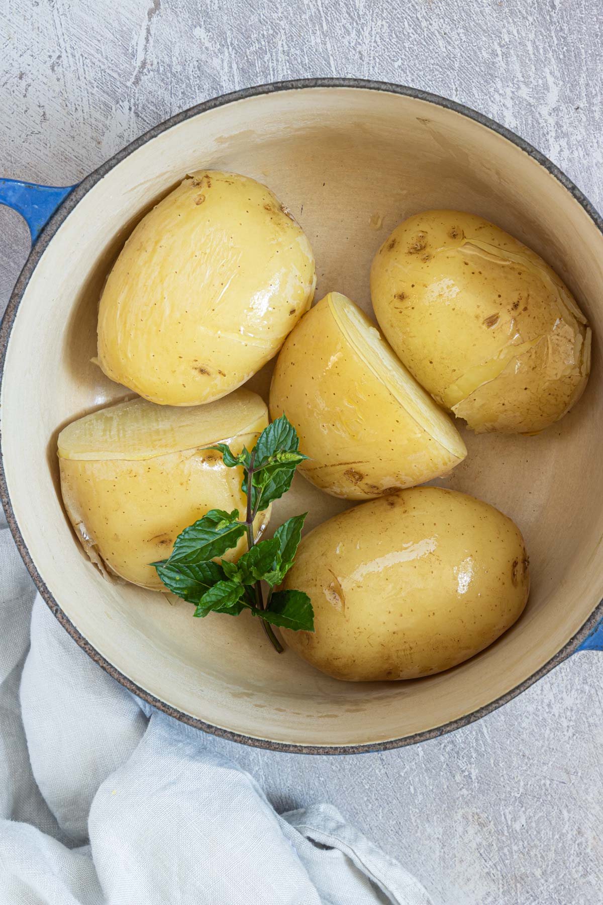 boiled potatoes inside a large pot