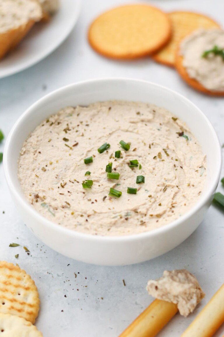 Tuna Pate in a white dip bowl with crackers around it.