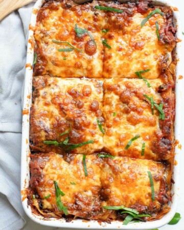 top down view of vegan lasagna cut into individual portions