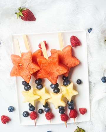 easy 4th of july fruit kabobs on a plate