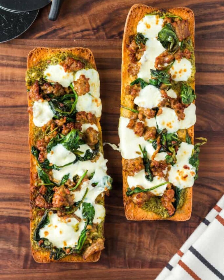 French Bread Pizza On A Wooden Chopping Board