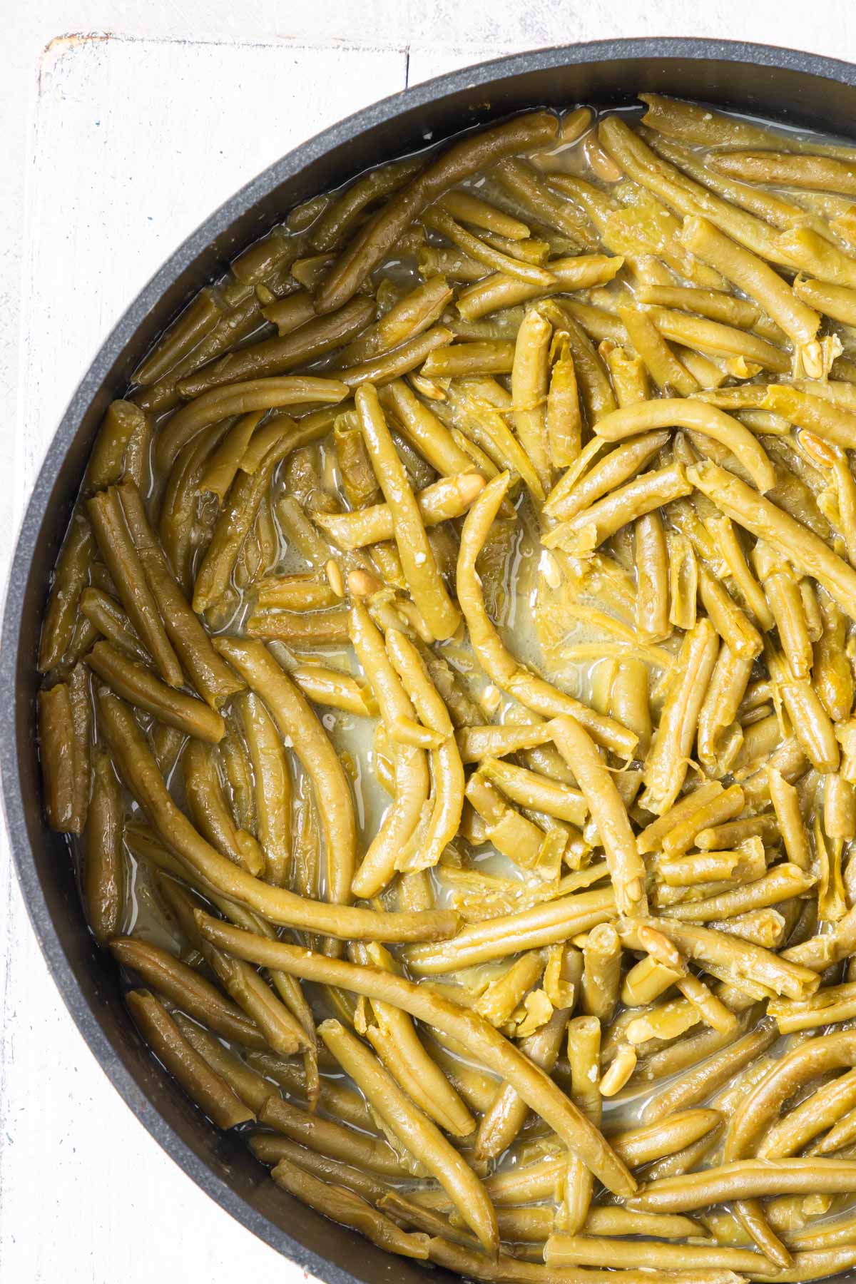 close up of the canned green beans being cooked