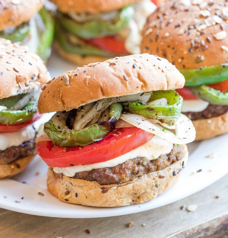Italian Grilled Hamburgers on a white plate.
