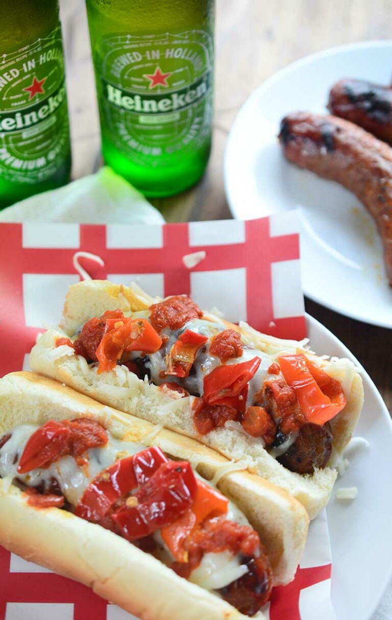 Spicy Italian Sausage Dogs on a white and red serviette