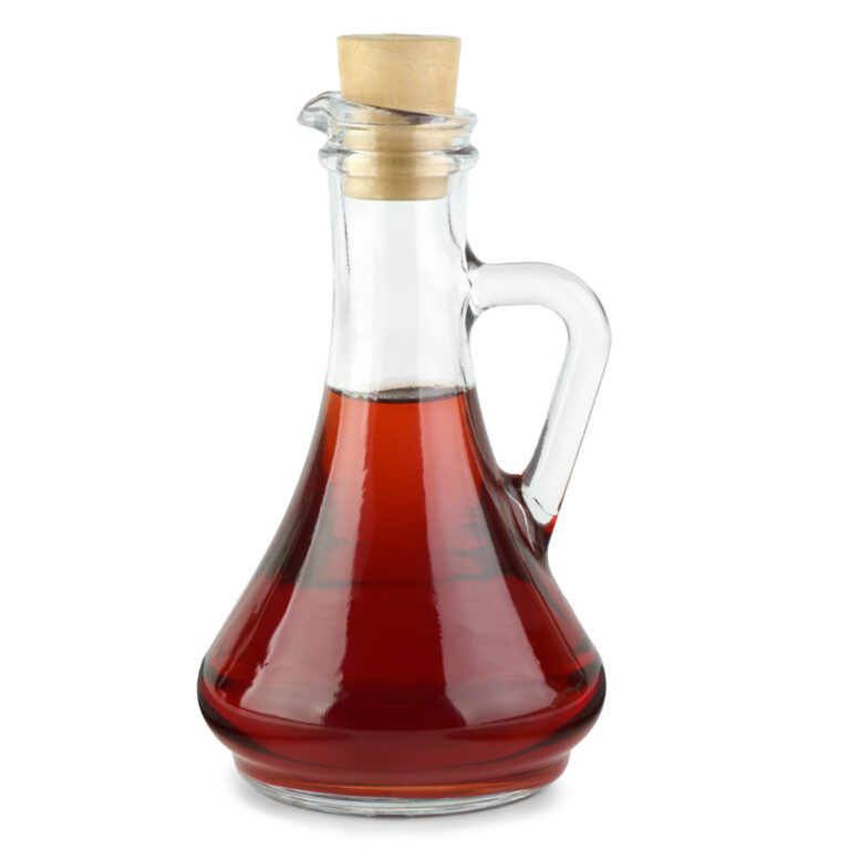 A glass decanter bottle of sherry vinegar
