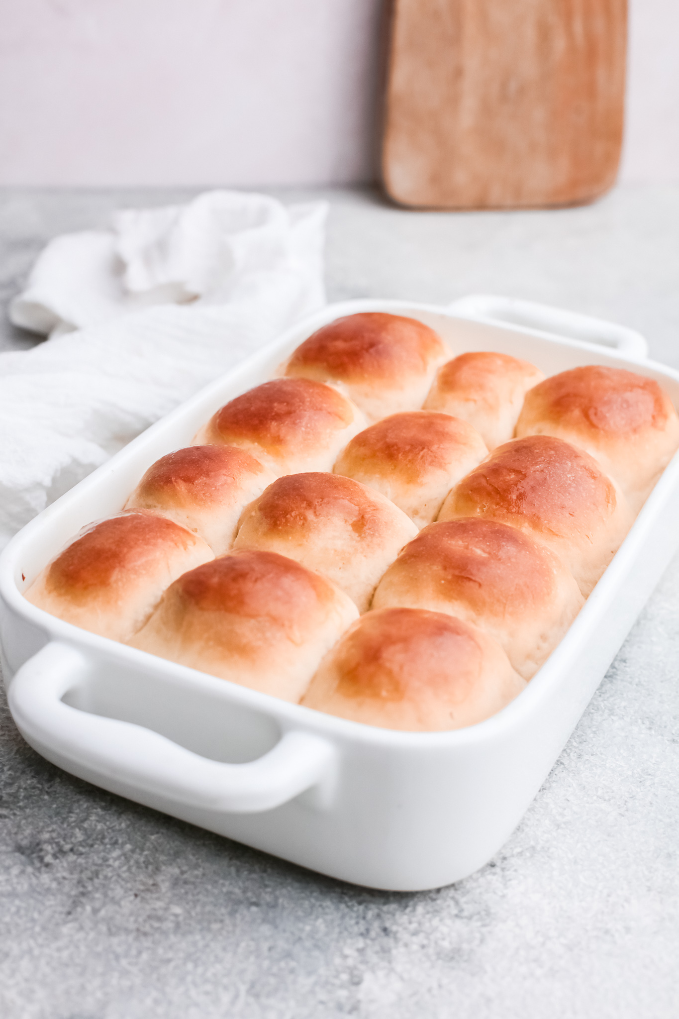 the completed easy yeast rolls in a baking dish