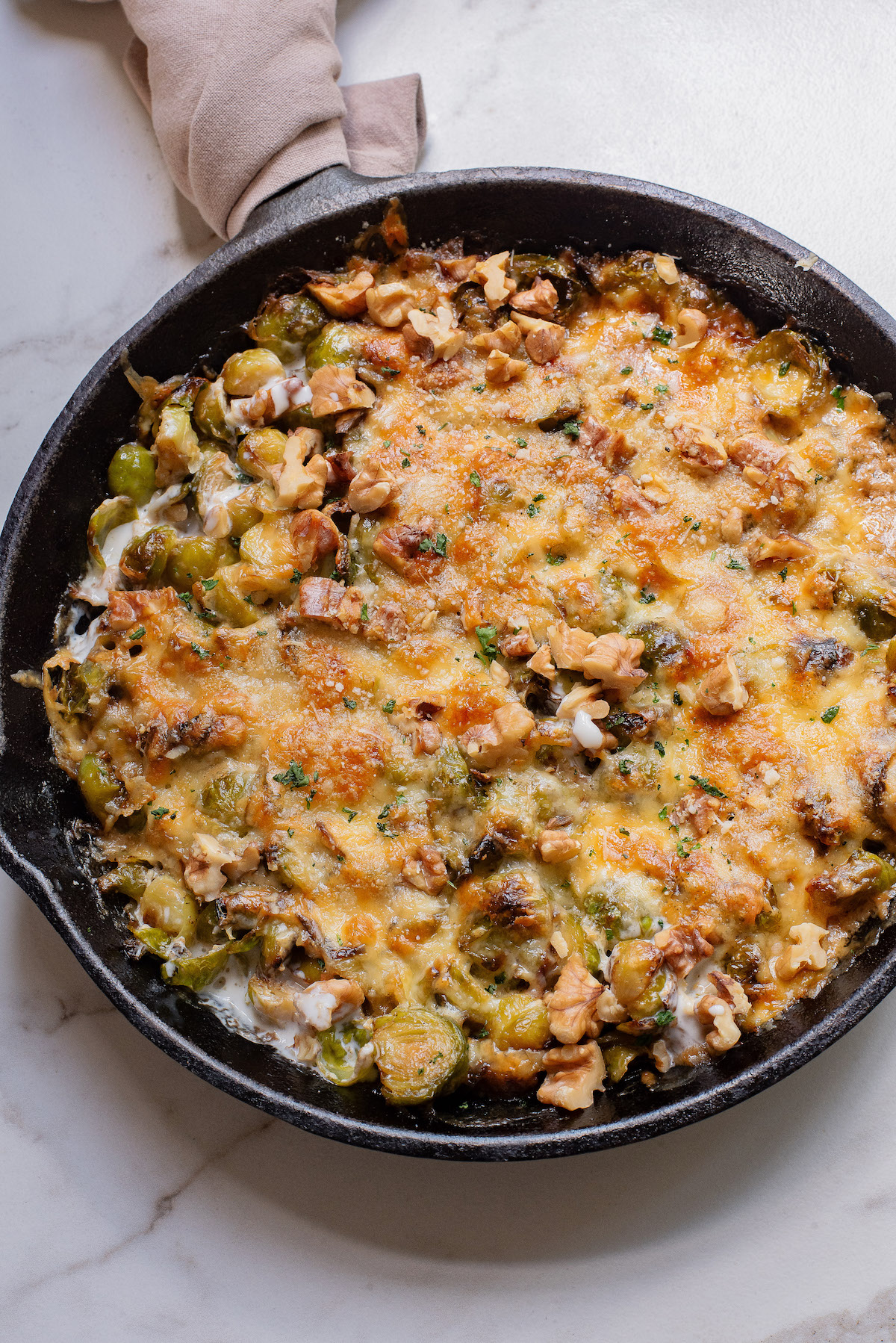 top down view of the brussel sprouts gratin in the skillet